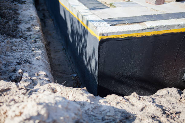 Professional Wet Basement Repair technician working in Manitou Beach, MI